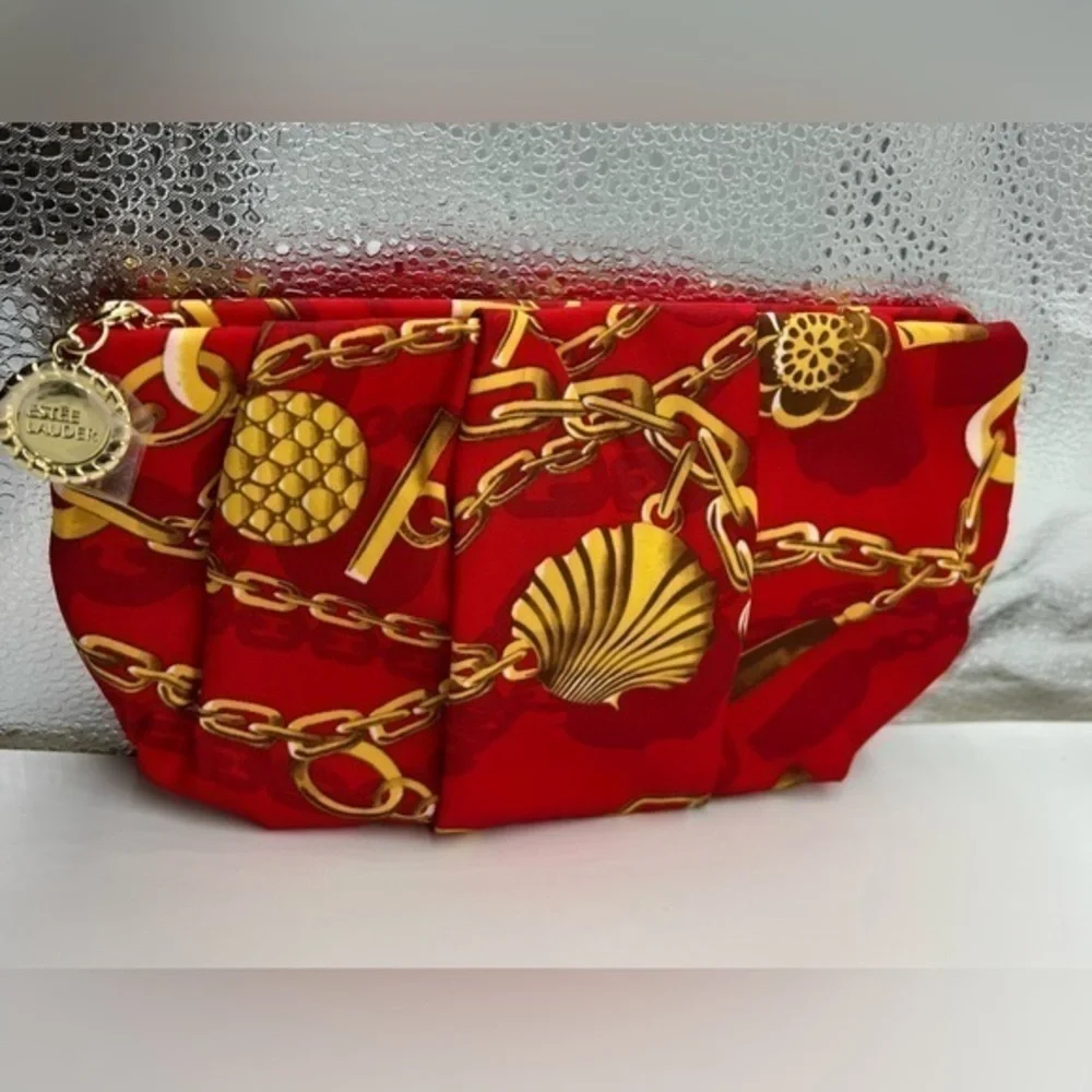 Estée Lauder red and gold cloth pleaded cosmetic bag NEW